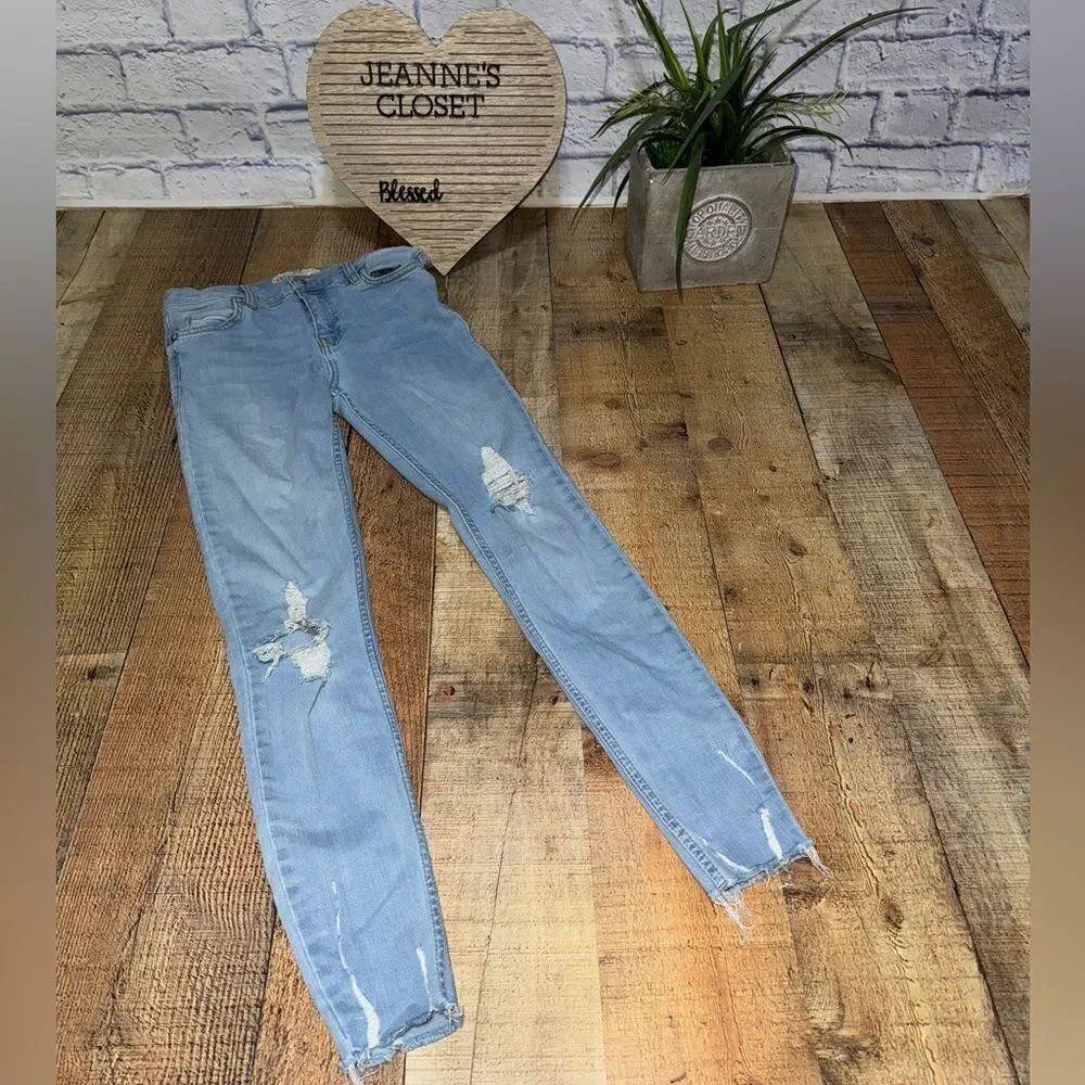Free People Distressed Raw Hem Jeans Size 25 light wash